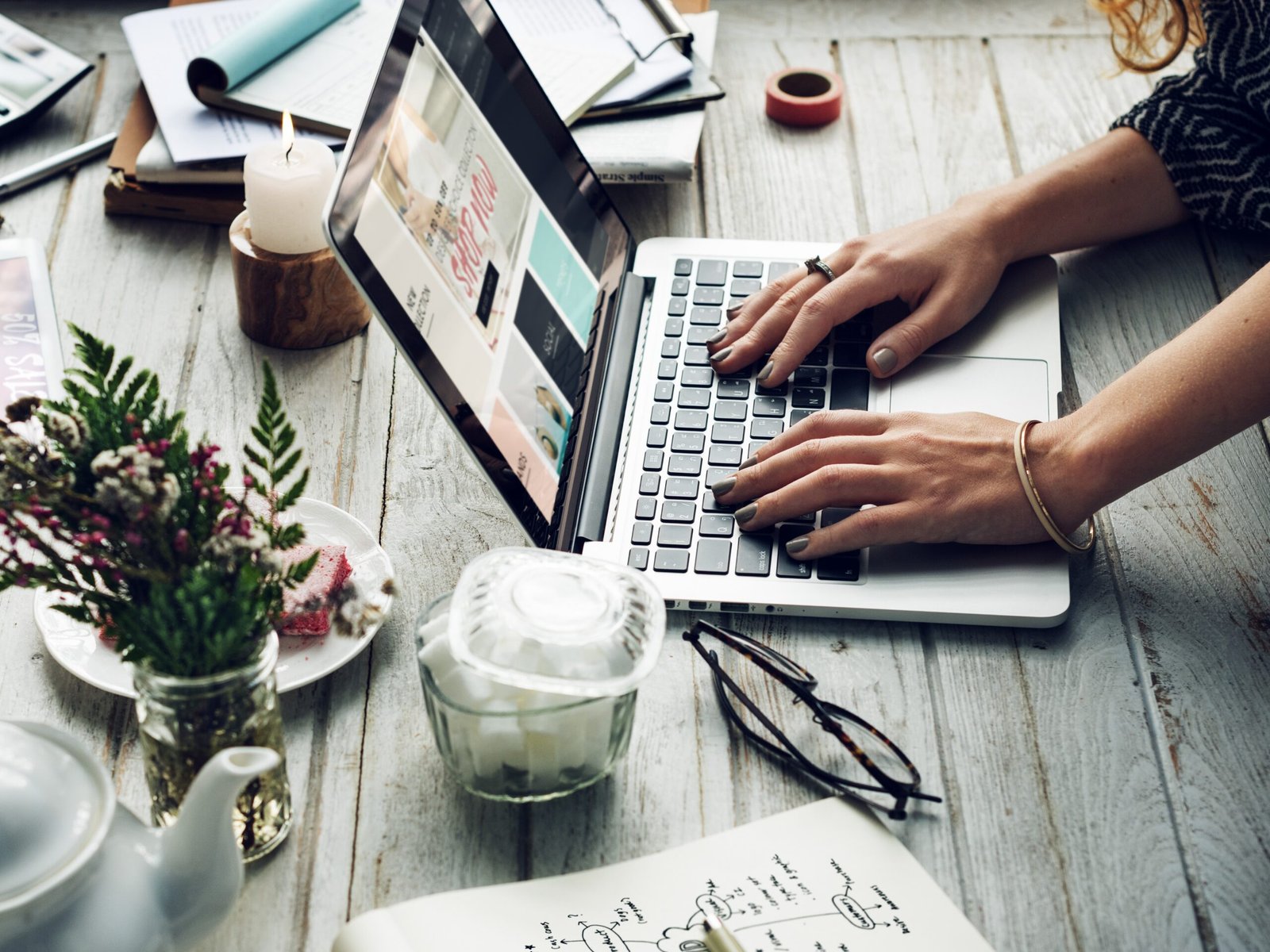 Side view of woman using computer laptop